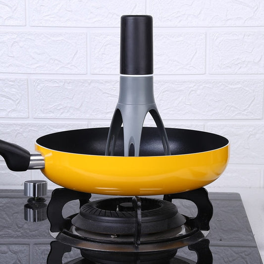 3-Speed Automatic Egg Beater in a yellow pan